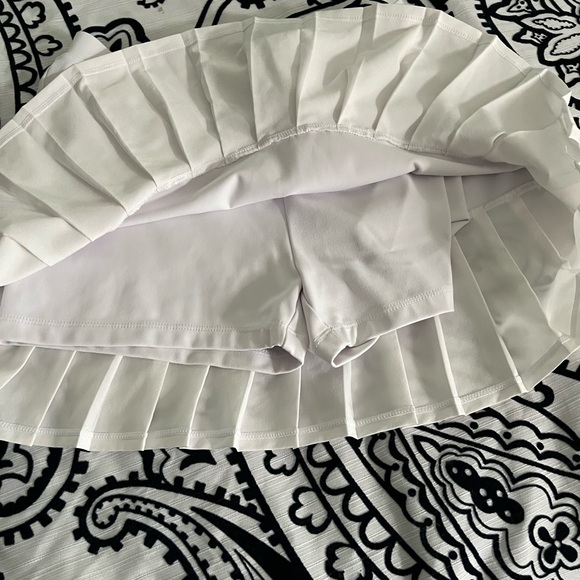 Savvi Pleated Paris Skort - Picture 2 of 5